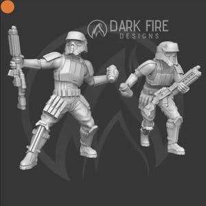 May include: Two detailed, light-colored action figures of soldiers in helmets and armor, holding weapons. One figure holds a large rifle, the other a grenade. The figures are set against a dark background with the text "DARK FIRE DESIGNS".