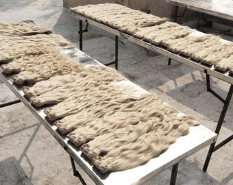 Curly blonde hair extensions