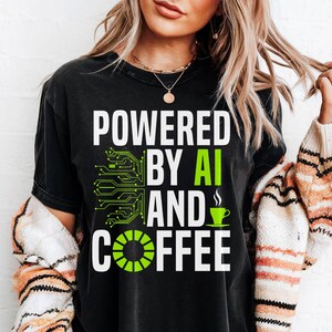 Powered By AI And Coffee T-shirt, Funny Geek AI Tee, Coffee Lover Shirt, AI Enthusiast Gift, Tech Humor Shirt, Developer Programmer Tee