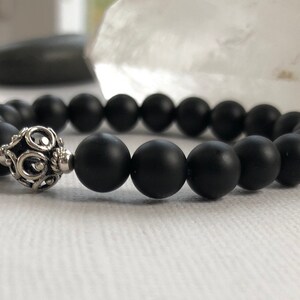 Black Onyx gemstone bracelet with Silver accent bead