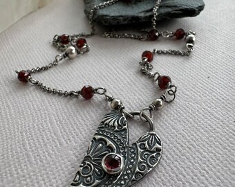 Garnet and sterling silver heart pendant necklace