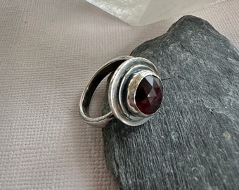 Artisan Sterling silver ring with Garnet gemstone.