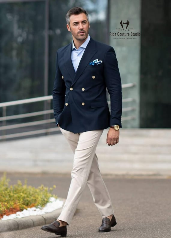 Navy Double-breasted Blazer With Cream Trousers: Elegant Men's
