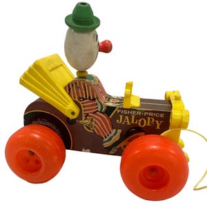 Zabawka na kółkach Fisher Price Jalopy z lat 60. nr 724 | działający klaun