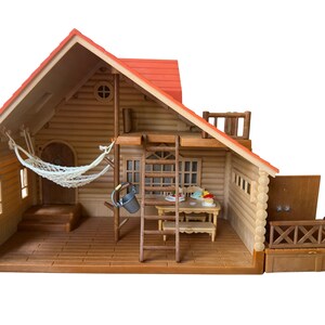 Sylvanian Families Log Cabin House-speelset Calico Critters Cottage + accessoires afbeelding 2