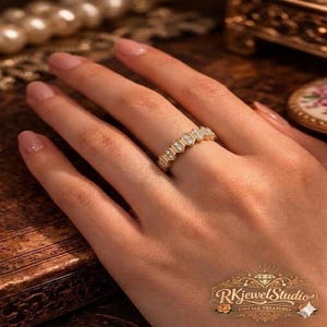 Hexagon diamond band worn on a single finger, showcasing geometric gold design with sparkling stones in elegant Art Deco inspired bridal styling