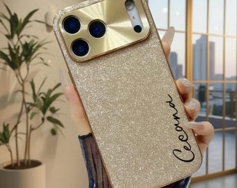 Funda personalizada para iPhone 17 Pro con purpurina dorada y destellos negros / Funda de lujo con nombre personalizado / Elegante protección metálica para la cámara