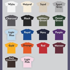 May include: A collection of t-shirts in various colors, including white, black, and navy. Each shirt displays its color name in a bold, white font. Other colors include light blue, gold, and maroon. The shirts are arranged on a light gray background.