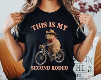 Funny Capybara Bicycle Shirt This Is My Second Rodeo Cowboy Hat Western Meme Tee