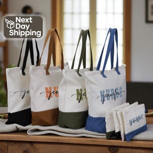 a collection of colorful tote bags with personalized names printed on them, arranged on a wooden surface.