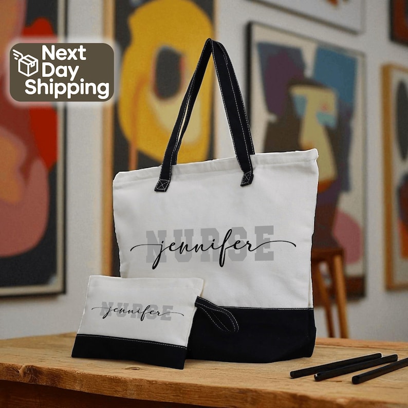 A tote bag with the name "Jennifer" printed on it, along with a smaller bag that also has the name "Jennifer" printed on it. The bags are placed on a wooden surface, and there are some artworks visible in the background.