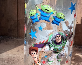 Lata de vidrio de Toy Story con tapa de bambú y pajita