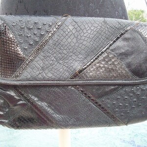 Monedero vintage de piel de cocodrilo y serpiente de Vasilis para trotar