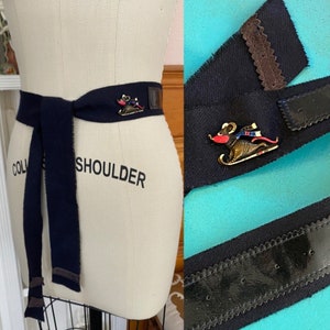 Vtg Anthropologie wool fabric Tie Belt S w/ mouse sled Pin embellishment patent leather navy metal