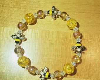 Armband med gyllene honungsbi
