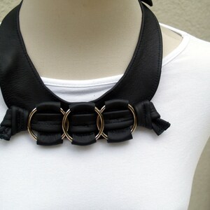 Black Leather Bib Necklace with Silver Rings