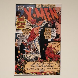 May include: A comic book page featuring the X-Men. The cover art shows a wedding scene with the text "X-MEN" in large orange letters. The text "AT LAST! The Wedding of Jean Grey and Scott Summers" is also visible.