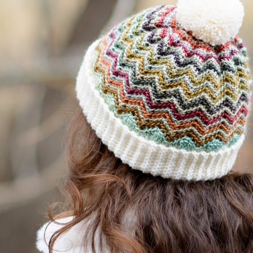 wooly hat with a peak