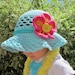 Reviewed by Anonymous reviewed CROCHET PATTERN - Island Girl - a sun hat with flower in 5 sizes (Infant, Baby, Toddler, and Child/Youth sizes) - Instant PDF Download