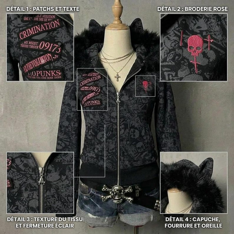 K&ouml;nnte beinhalten: Schwarzer Kapuzenpullover mit Totenkopfmuster und Aufn&auml;hern mit der Aufschrift "CRIMINATION", "09173" und "REVOLUTION". Der Hoodie hat eine mit Kunstfell gef&uuml;tterte Kapuze mit Katzenohren und eine Totenkopfstickerei.