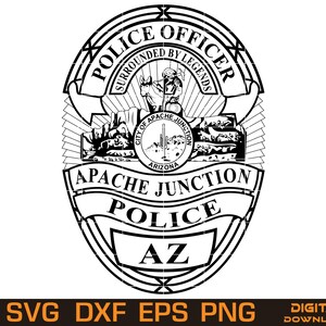 May include: A black and white Apache Junction Police badge design. The badge features the text "POLICE OFFICER SURROUNDED BY LEGENDS" and "CITY OF APACHE JUNCTION ARIZONA". The bottom of the badge reads "APACHE JUNCTION POLICE AZ".
