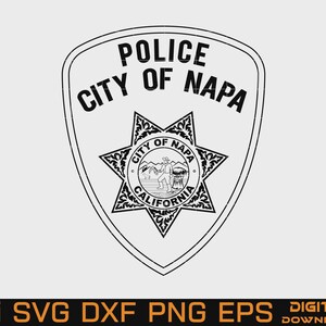 May include: A black and white graphic design of the City of Napa police badge. The shield-shaped emblem features the text POLICE CITY OF NAPA above a six-pointed star containing a circular seal with a person working in a field and mountains.