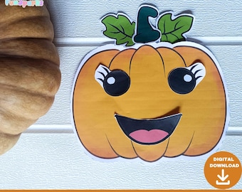 May include: A smiling cartoon pumpkin craft with a green stem and leaves. The pumpkin is orange with black eyes and a pink mouth. The text "BUILD A PUMPKIN CRAFT" is at the bottom, with a "DIGITAL DOWNLOAD" icon.