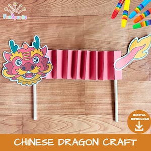 May include: A colorful Chinese dragon craft made of paper. The dragon's head is red, yellow, and green, with a smiling face. The body is a pink accordion-folded paper. The text "CHINESE DRAGON CRAFT" is at the bottom.