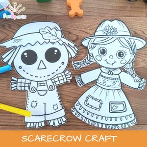 May include: Two black and white scarecrow craft cutouts. One is a scarecrow with a hat and overalls. The other is a girl scarecrow with pigtails and a dress. The words "SCARECROW CRAFT" are printed in orange at the bottom.