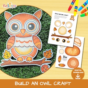 May include: A paper craft kit featuring a large orange owl illustration, two instruction sheets titled Build an Owl Craft, and colourful markers. The owl is perched on a brown branch with autumn leaves, and the sheets show cut-out shapes.