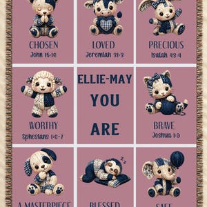 May include: A decorative throw blanket with a grid pattern featuring adorable animal illustrations and inspirational words. The blanket includes the text "CHOSEN", "LOVED", "PRECIOUS", "WORTHY", "BRAVE", "A MASTERPIECE", "BLESSED", and "SAFE". The name "ELLIE-MAY YOU ARE" is also displayed.