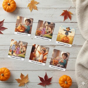 May include: A set of Halloween-themed cards with illustrations of children and pumpkins. The cards feature text such as "Pumpkins grow in fall", "We carve happy pumpkins", and "The jack-o-lantern glows". Autumn leaves and pumpkins are also visible.