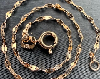 Pulsera de eslabones espejo de oro rosa italiano macizo de 10k, 7 pulgadas de largo, 1,3 mm de ancho.