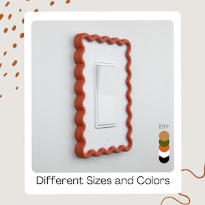 May include: A decorative, scalloped-edge light switch cover in a warm, reddish-orange colour. The cover surrounds a white light switch on a white wall. The image includes the text "Different Sizes and Colors" and a colour palette.