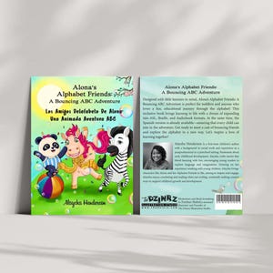 May include: A children's book cover titled "Alona's Alphabet Friends: A Bouncing ABC Adventure." The cover features colorful illustrations of a panda, a horse, and a zebra. The book's title is in English and Spanish.
