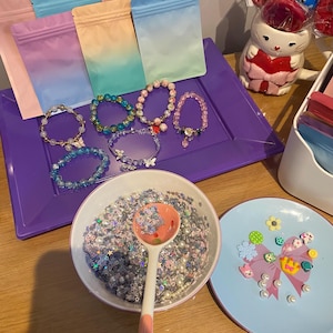 Bracelet Bags + Lucky beads enclosed x 1 Scoop. Could be up to 10 bags