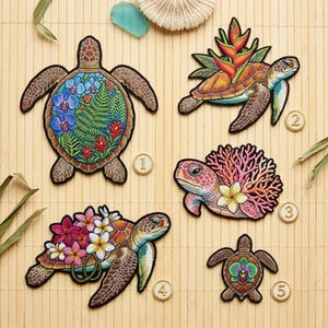 May include: Embroidered patches featuring sea turtles with floral and botanical designs. Each patch showcases a different turtle with unique details, including orchids, ferns, and tropical flowers. The patches are in various colors, including brown, green, blue, and pink.