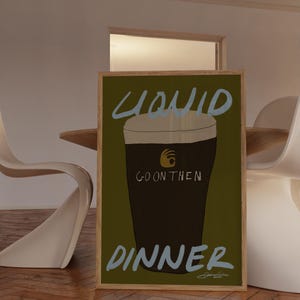 May include: A white ceramic mug with a black handle and the text "But First, Coffee" in a bold, black font. The mug is set against a blurred background, suggesting a cozy setting. The mug appears to be approximately 4 inches tall.