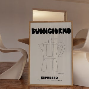 May include: A rectangular framed wall art print featuring a black line drawing of a moka pot centered on a white background. The text BUONGIORNO appears in large bold black letters at the top, with ESPRESSO and smaller text below the drawing.