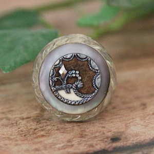 embellished with a flower on an adjustable band Flower Ring Silver button Daughter Gift