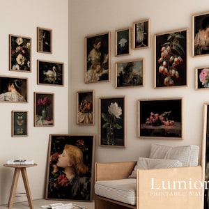 May include: A collection of framed vintage art prints displayed on a wall. The selection includes floral still lifes, portraits, and landscapes in wooden frames. The colour palette is dominated by dark tones, with pops of red, white, and green.