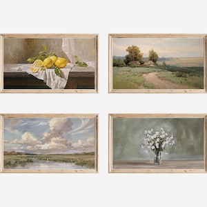 May include: Four framed vintage landscape and still life paintings. One features lemons on a table, another a rural path, a third a marshy landscape, and the last a vase of white flowers.