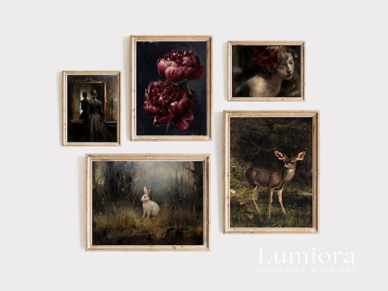 May include: Five framed vintage-style art prints are displayed. The prints feature botanical and animal themes, including a deer, a rabbit, and dark red peonies. The art pieces are in wooden frames, creating a cohesive gallery wall aesthetic.