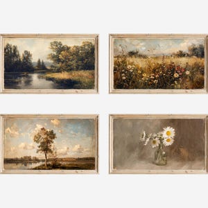 May include: Four framed landscape paintings. One depicts a river scene with trees, another a field of wildflowers, a third a lone tree by a lake, and the last a vase of daisies. The frames are light-colored wood.