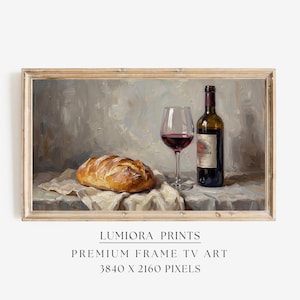 Puede incluir: Pintura enmarcada de naturaleza muerta con pan, una copa de vino tinto y una botella de vino. La obra utiliza una paleta de colores apagados, destacando las texturas del pan y el vino.