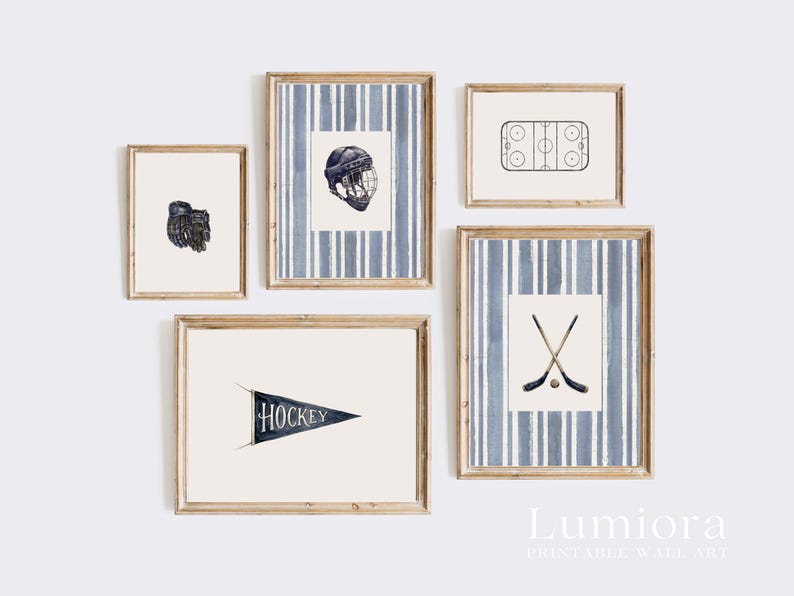 May include: A set of five framed wall art prints with a hockey theme. The prints feature illustrations of a hockey glove, helmet, rink, crossed hockey sticks and a pennant with the word "HOCKEY". The frames are a light wood color.