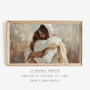 May include: A framed print of a painting depicting two figures embracing. The figures are rendered in soft, warm tones, with one figure in white robes. The frame is a light brown color. The text "LUMIRA PRINTS" and "PREMIUM FRAME TV ART" are visible.