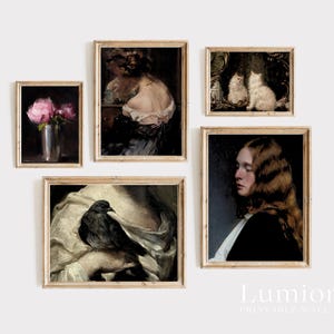 May include: A set of five framed vintage art prints. The prints depict classic paintings with subjects such as flowers, portraits, and animals. The frames are a light wood colour, and the overall aesthetic is antique and elegant.