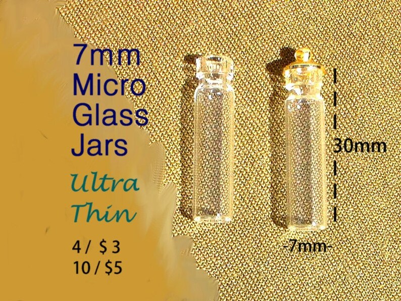 May include: Two clear glass jars with gold lids. The jars are 7mm in diameter and 30mm tall. The text on the image reads "7mm Micro Glass Jars Ultra Thin 4/$3 10/$5".