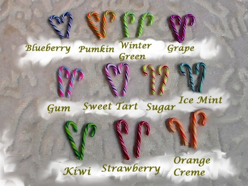 May include: Assortment of candy cane ornaments with different colors and flavors, including blueberry, pumpkin, winter green, grape, gum, sweet tart, sugar, ice mint, kiwi, strawberry, and orange creme.
